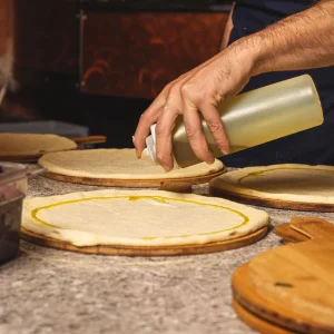 Gallio Mediterranean Restaurant London Chef Making Pizza Experts in Dough scaled